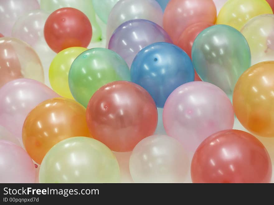 Many coloured balloons as background