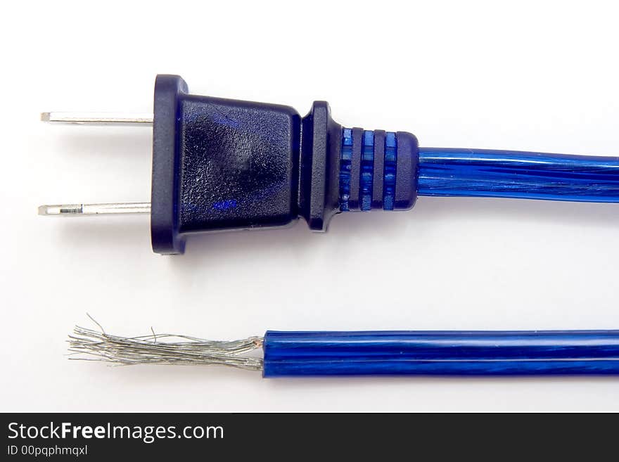 A blue power cord with a cut and frayed end. A blue power cord with a cut and frayed end.