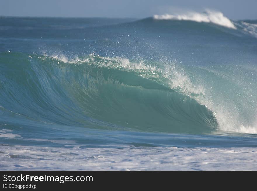 Giant wave breaking on the north shore of oahu. Giant wave breaking on the north shore of oahu