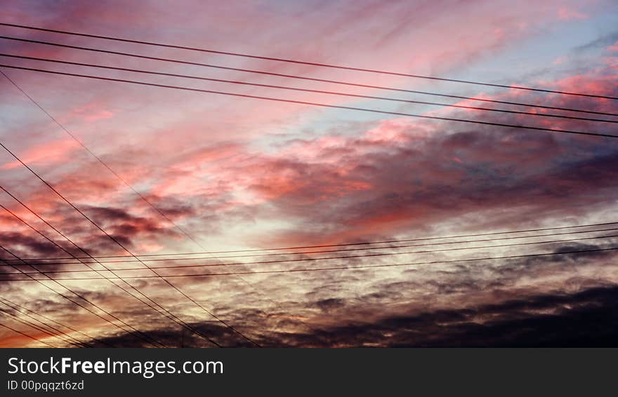 Sky after sunset with crosses of lead wires