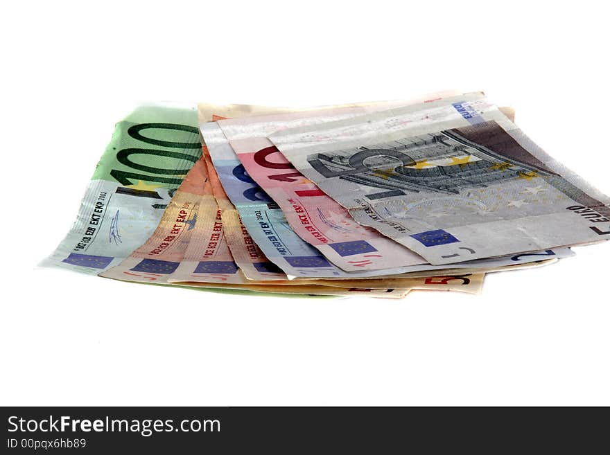 An isolated shot of Euro banknotes in all sizes. A lot of white space for text. An isolated shot of Euro banknotes in all sizes. A lot of white space for text.