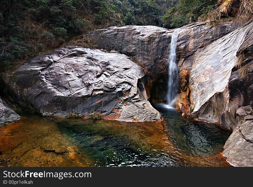 One of the Nine-Dragon waterfalls at Huangshan in China. One of the Nine-Dragon waterfalls at Huangshan in China.