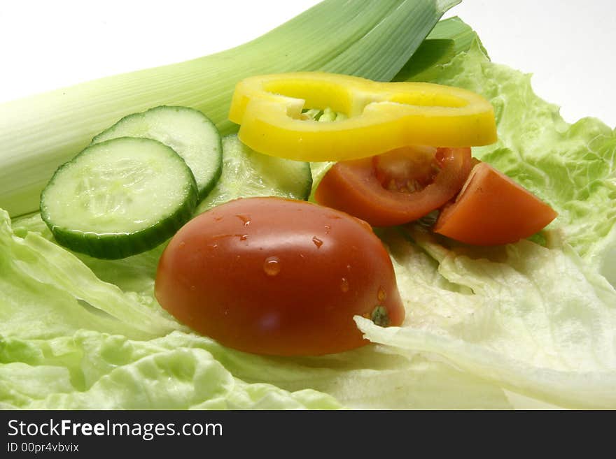 Green vegetables on the white background. Green vegetables on the white background