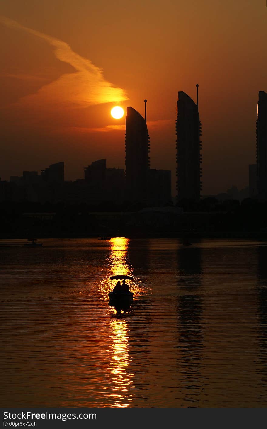 It's a typical city sunset at the lake side in shanghai. It's a typical city sunset at the lake side in shanghai