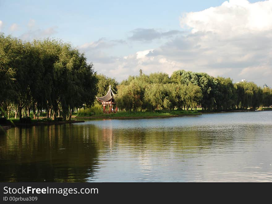 Chinese pagoda on a small island in a park in Autumn. Chinese pagoda on a small island in a park in Autumn