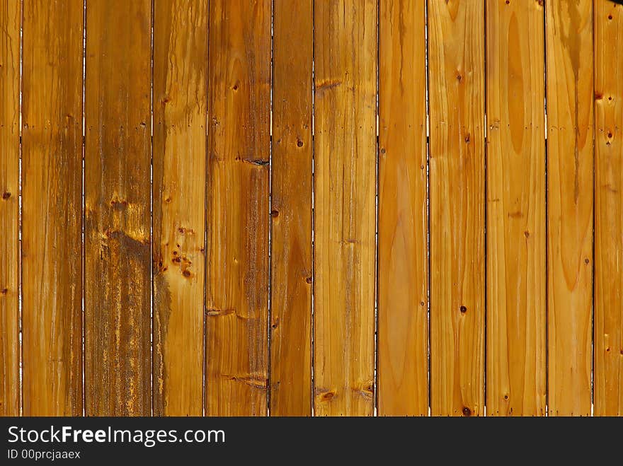 Brown wooden wall in straight line