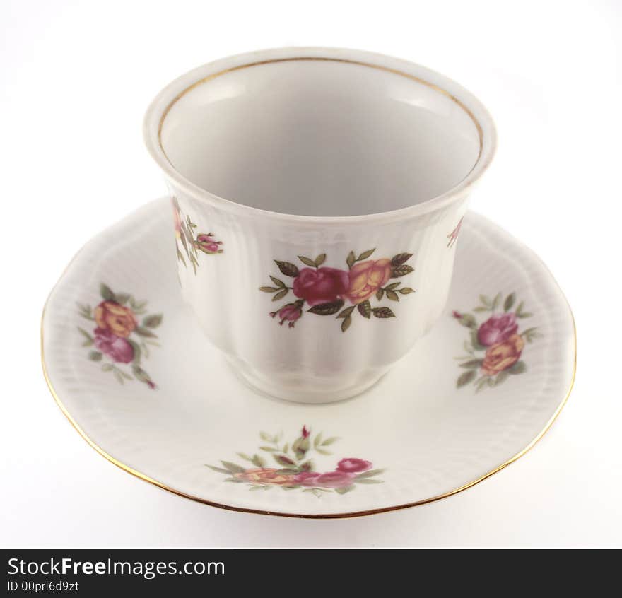 Porcelain cup on white background