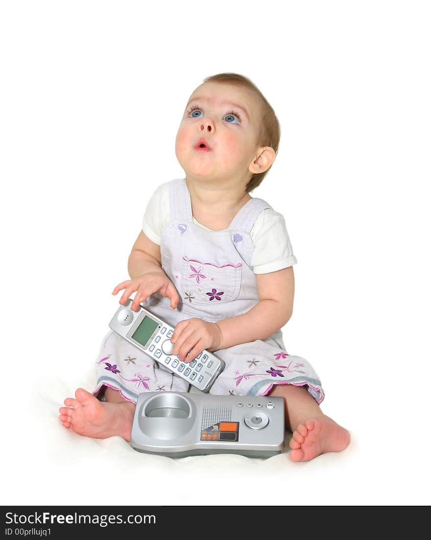 The small child with phone on a white background