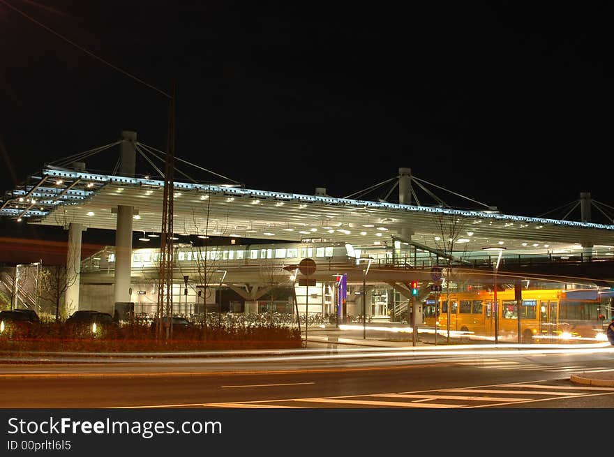 Train station and moving bus by night. Train station and moving bus by night