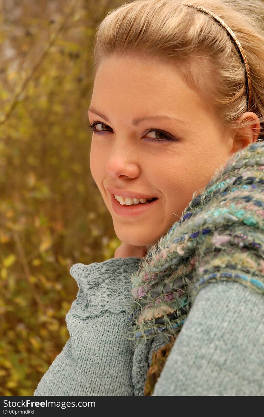 Portrait of Beautiful blonde in autumn setting. Portrait of Beautiful blonde in autumn setting.