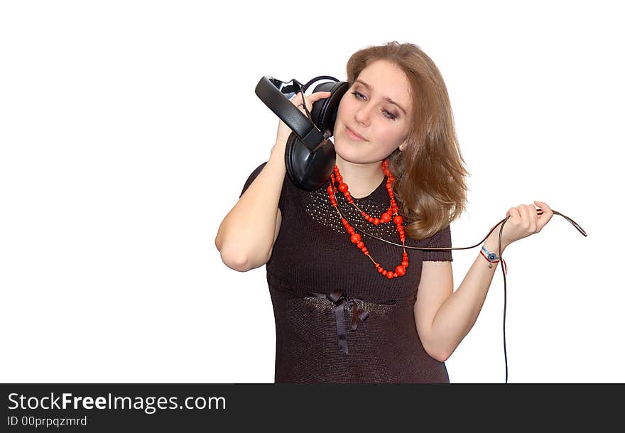 Beautiful young girl with headphones isolated over a white background