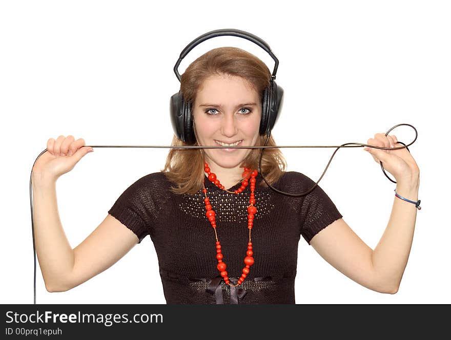 Beautiful young girl with headphones isolated over a white background