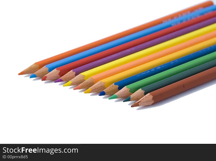 Colored pencils in a row