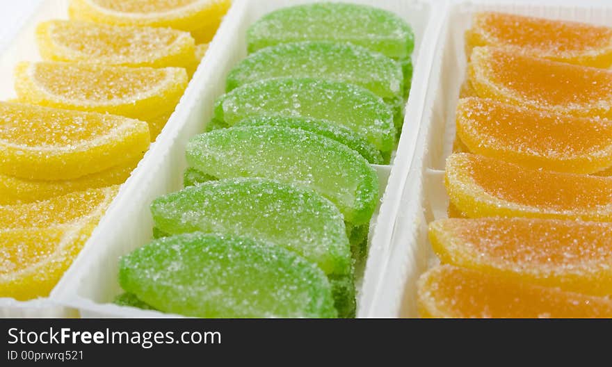 Colourful fruit candies in box