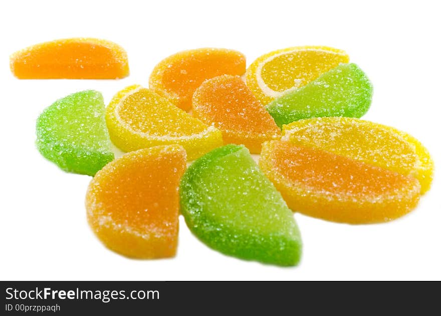 Colourful fruit candies isolated over white