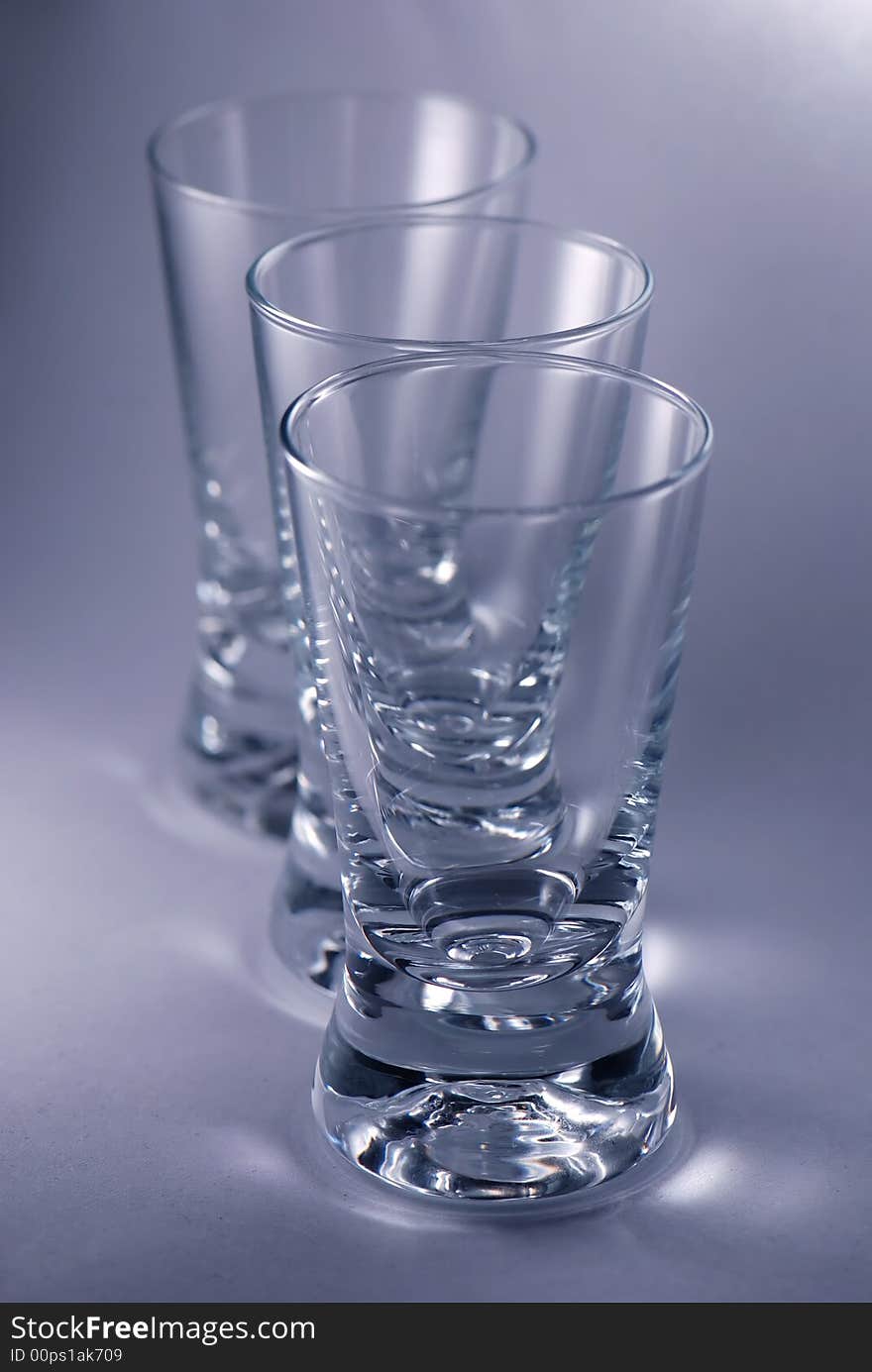 A row of vodka glasses