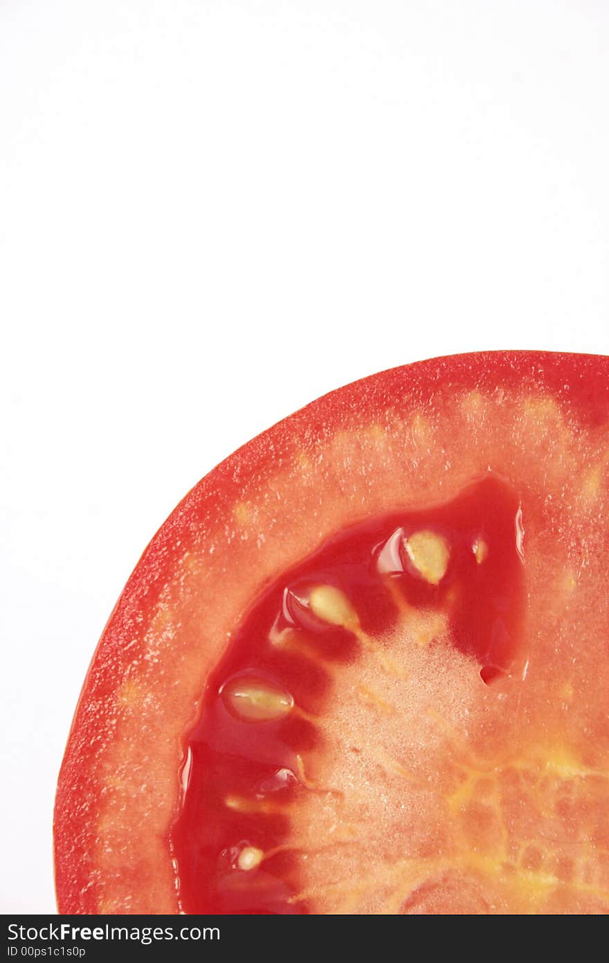 Tomato cross section isolated on white background