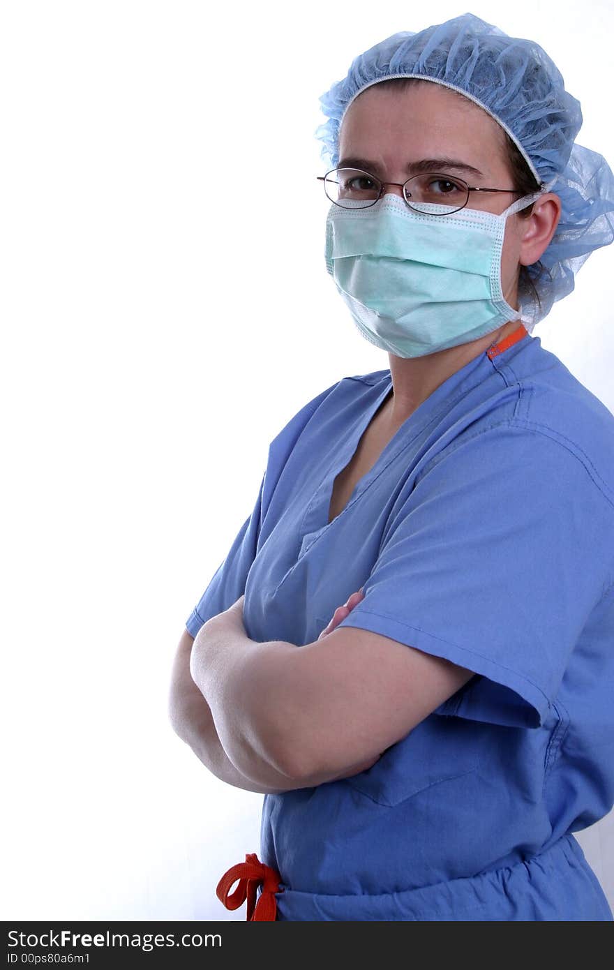 A nurse or surgeon wearing a surgical mask on white background.