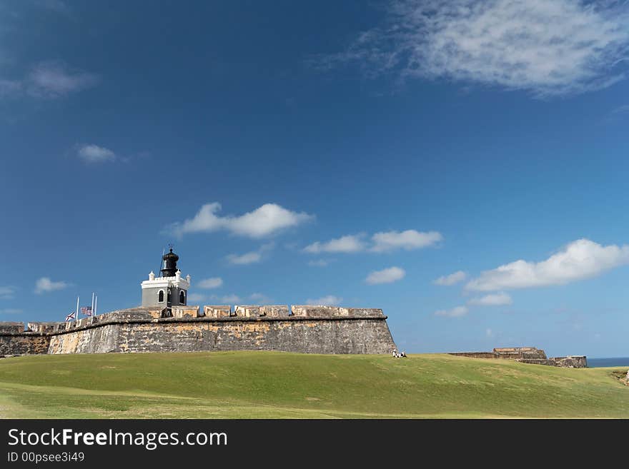 Panorama view of a historical caribbean fortress and lighthouse