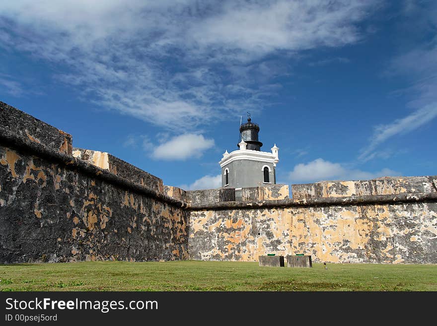 Panorama view of a historical caribbean fortress and lighthouse