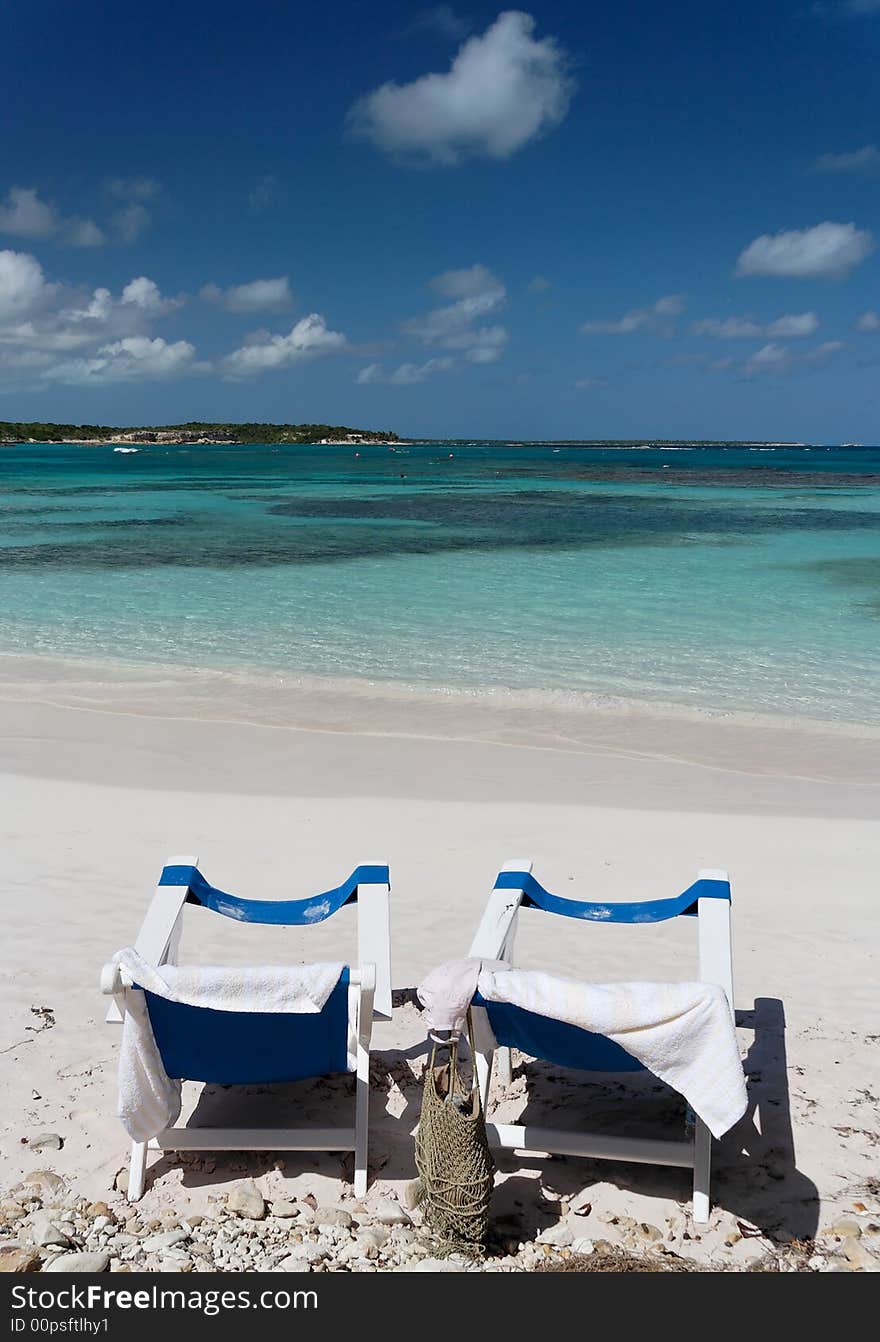 Canvas chairs on a beautiful caribbean beach. Canvas chairs on a beautiful caribbean beach