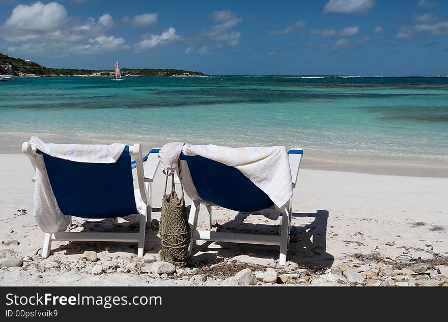 Canvas chairs on a beautiful caribbean beach. Canvas chairs on a beautiful caribbean beach