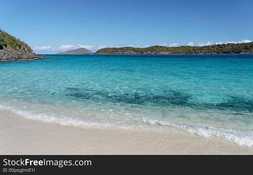 Beautiful white caribbean beach with clear blue water