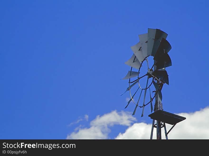 Farm wind mill blue sky