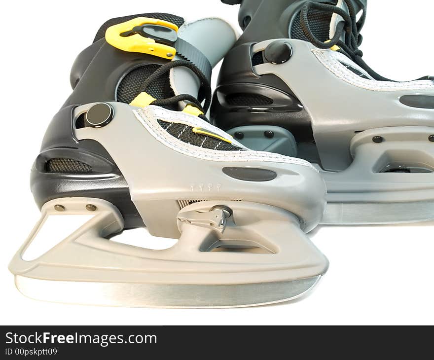 Close-up of children skates pair isolated over white. Close-up of children skates pair isolated over white