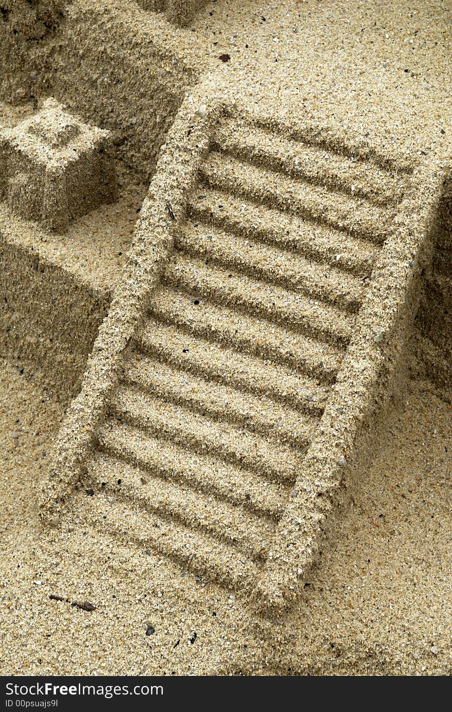 Stairs made out of sand, not a steady support.  For metaphors signifying less than firm or even dangerous support. Stairs made out of sand, not a steady support.  For metaphors signifying less than firm or even dangerous support.