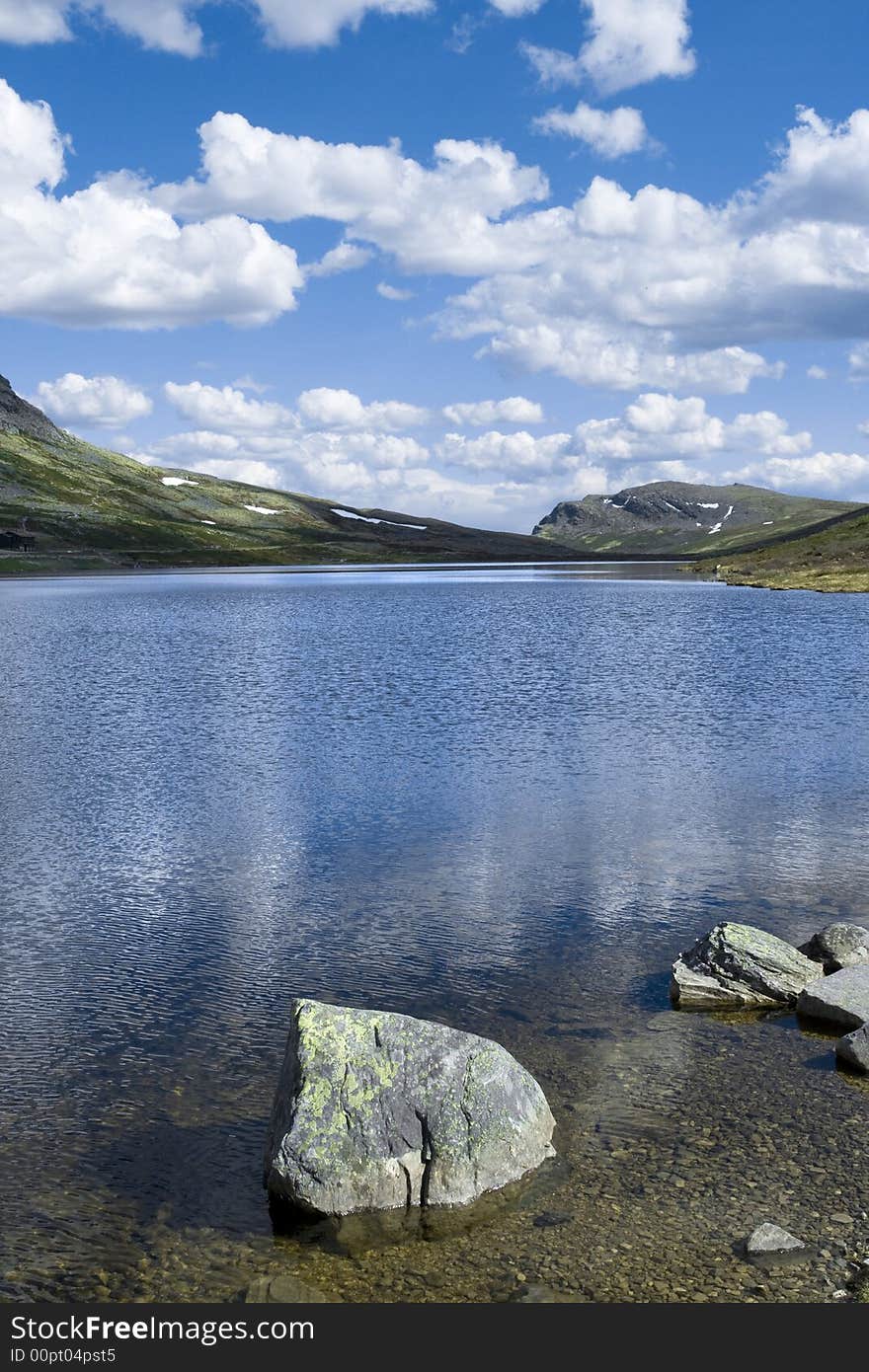 Mountain lake, summer, blue sky, Norway