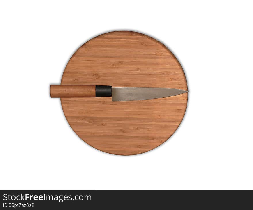 Knife on the brown chopping board