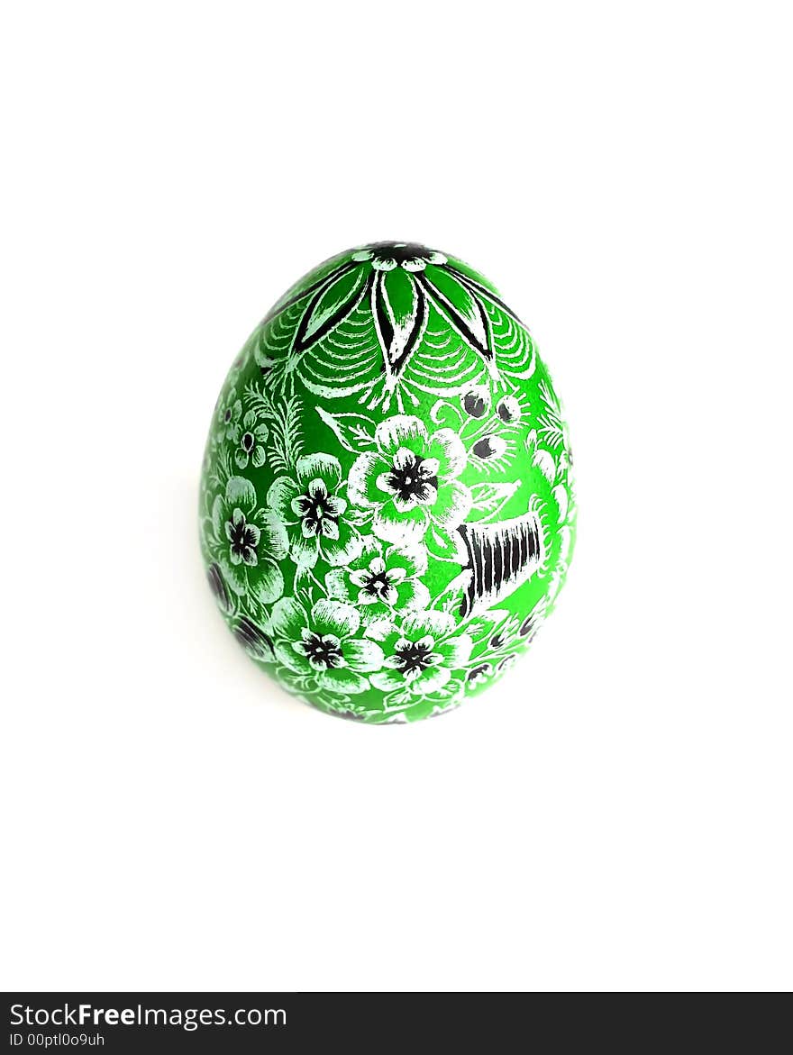 Green Easter egg on white