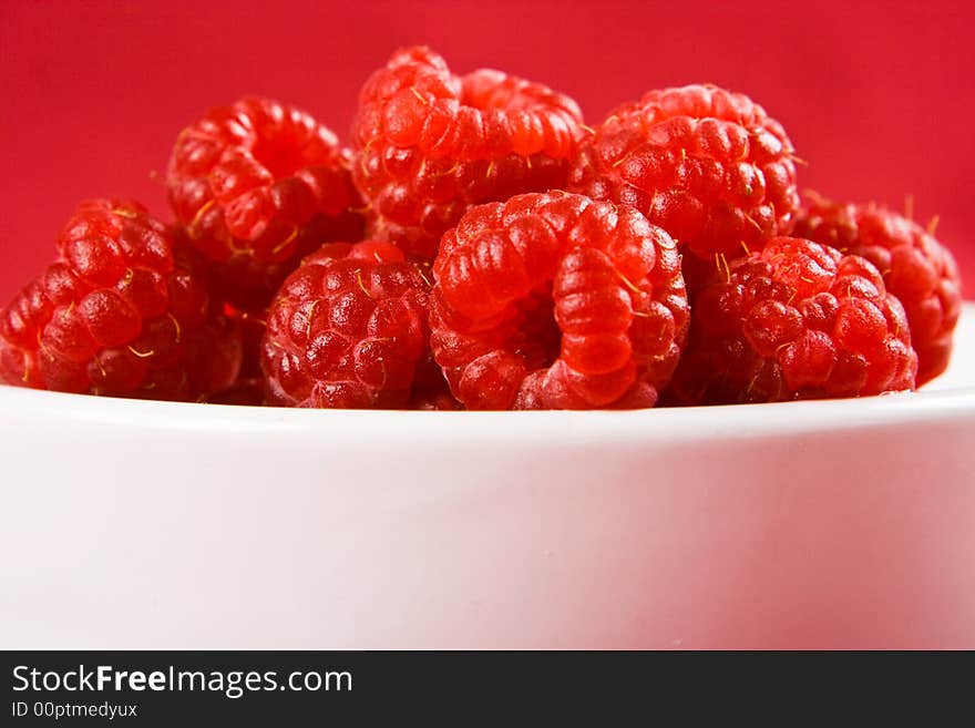 A dish or raspberries