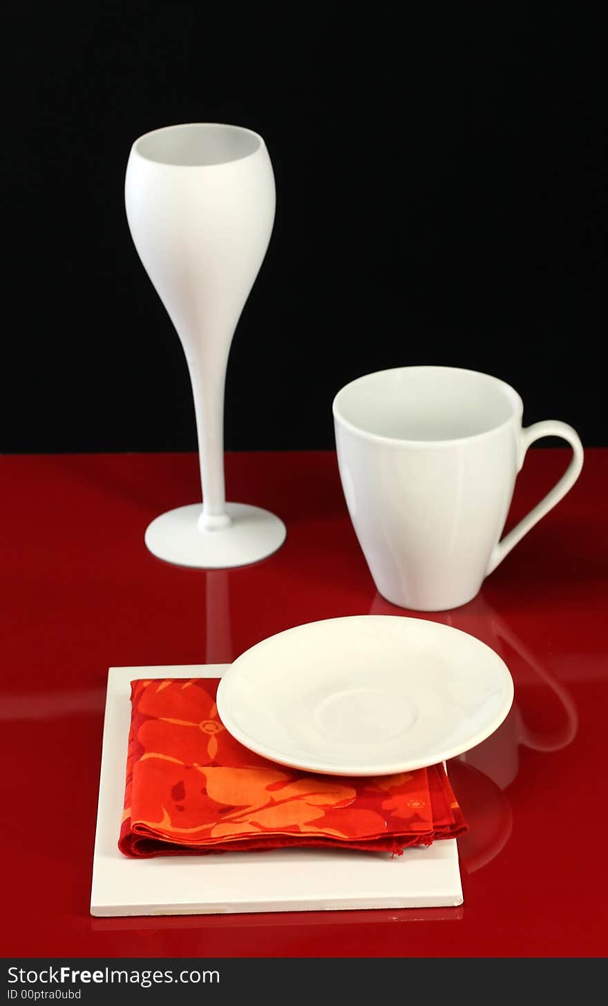 Modern dishware table design in red and white. Modern dishware table design in red and white