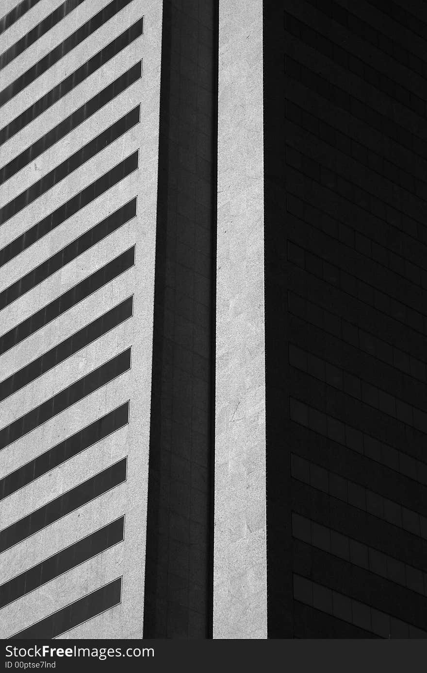 Windows and Shadows on an office building during sunrise/sunset.