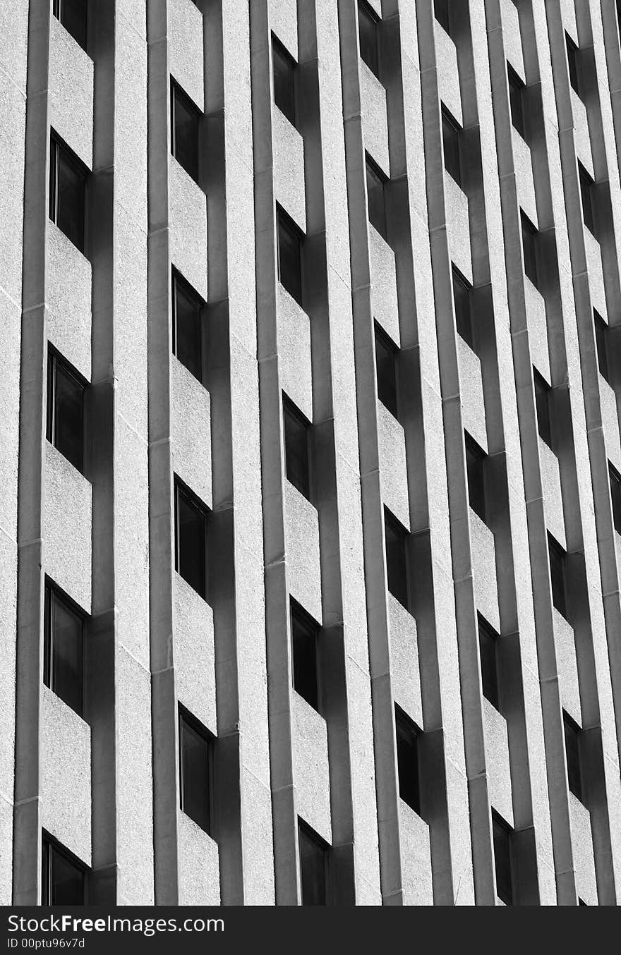 Windows and Shadows on an office building during sunrise/sunset.