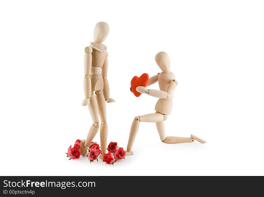 Little wooden Man offering his heart to a little wooden woman. Valentine's day card. Isolated on white background.
Clipping path included. Little wooden Man offering his heart to a little wooden woman. Valentine's day card. Isolated on white background.
Clipping path included.