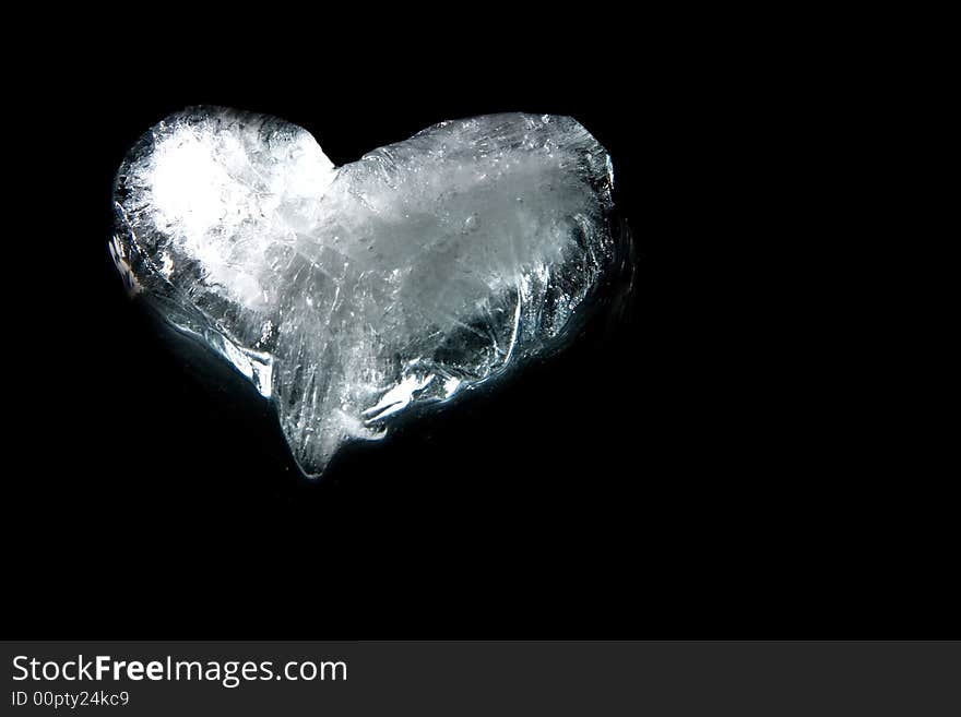 Ice heart on black background