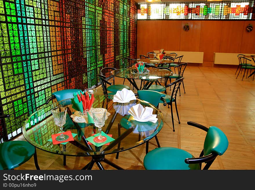 Classic small restaurant interior with setup table