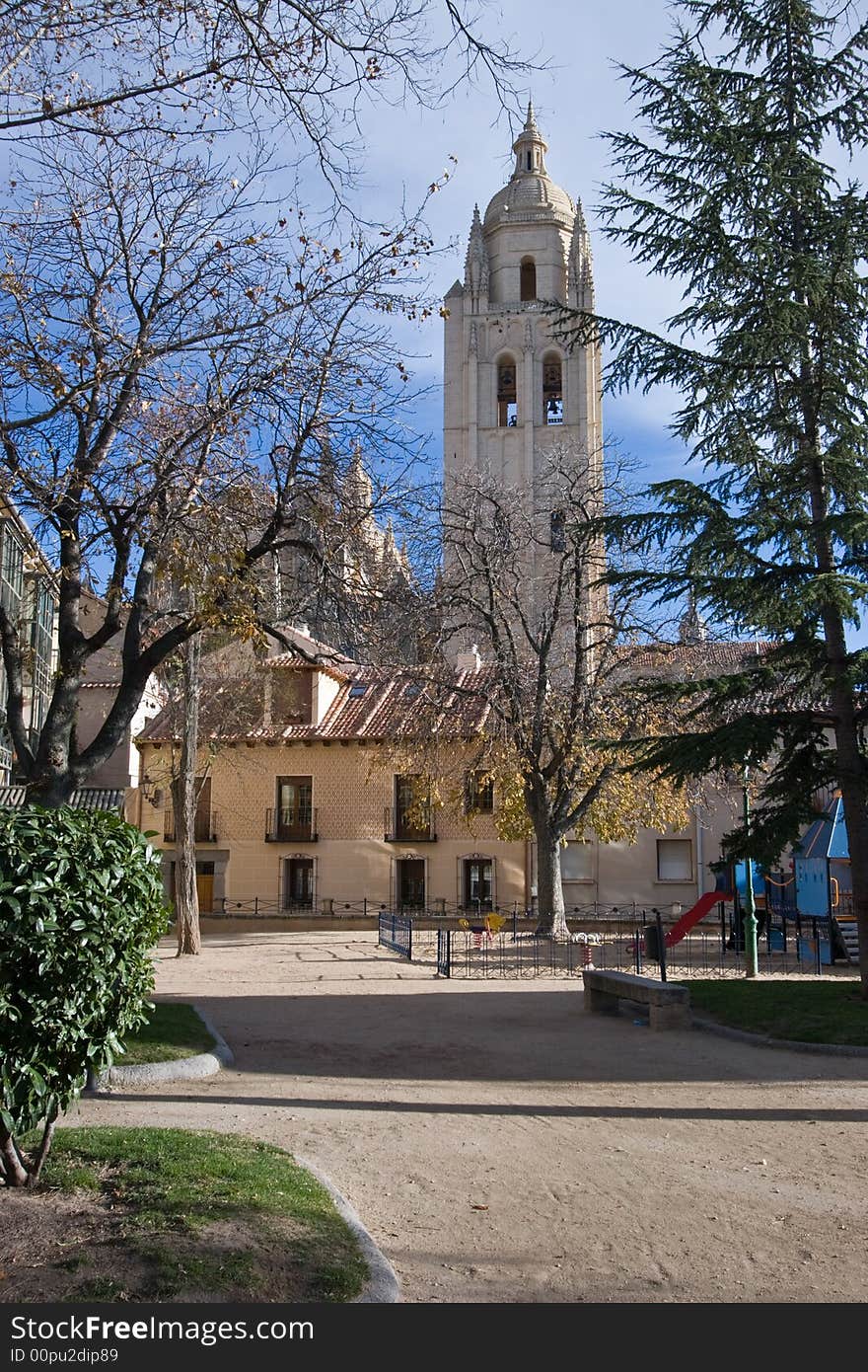 An empty Segovian Park and Church, Spain.