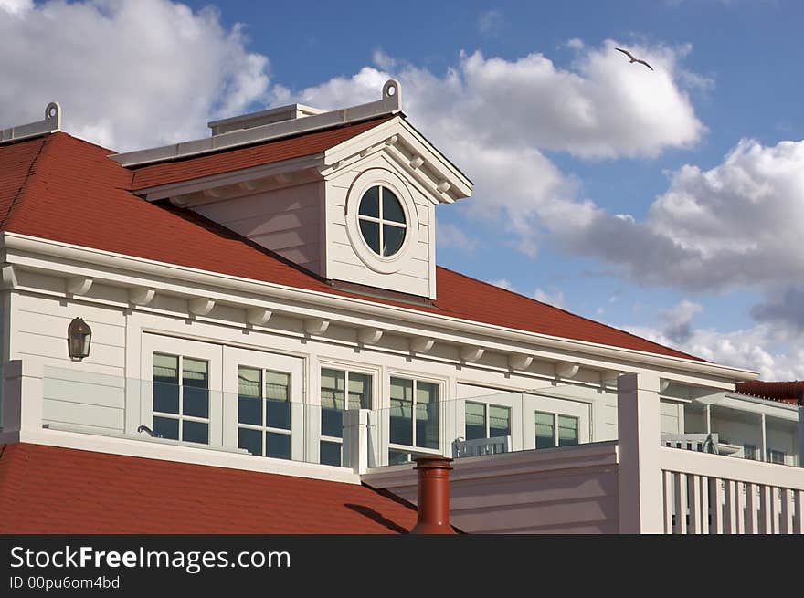 Beach Front Accommodations on a sunny day with cloudy blue skies. Beach Front Accommodations on a sunny day with cloudy blue skies