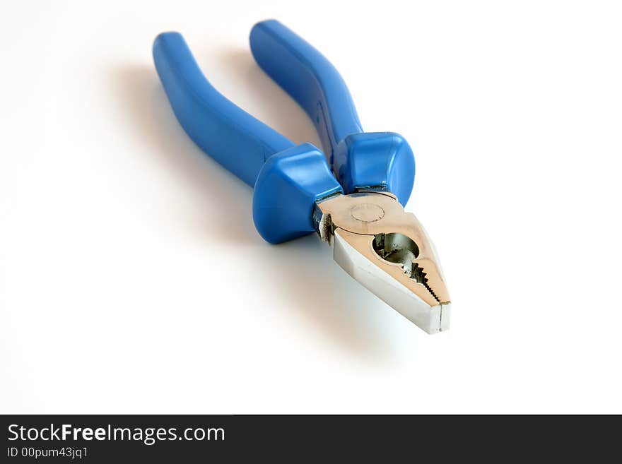 Blue pliers on white background