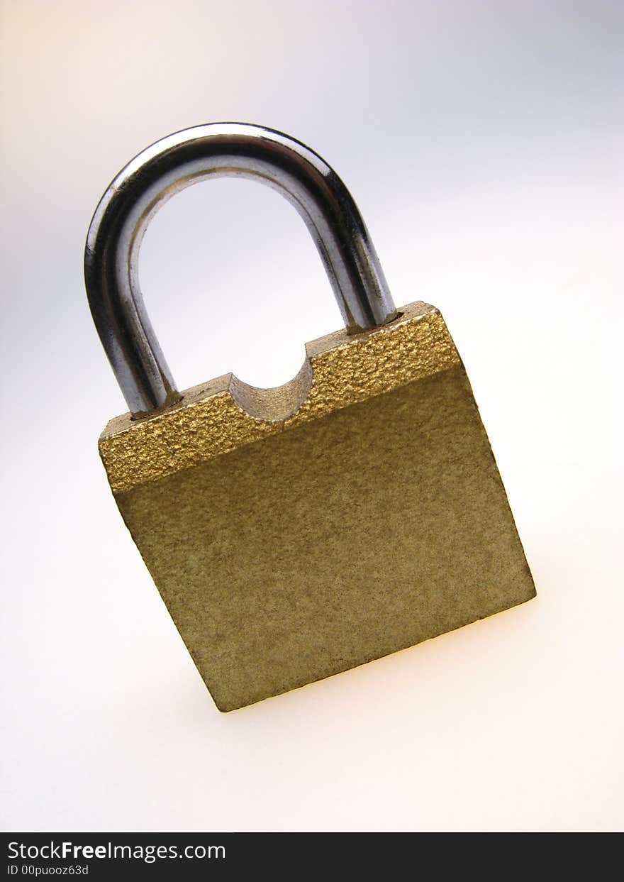 Closed padlock on  light background, close up