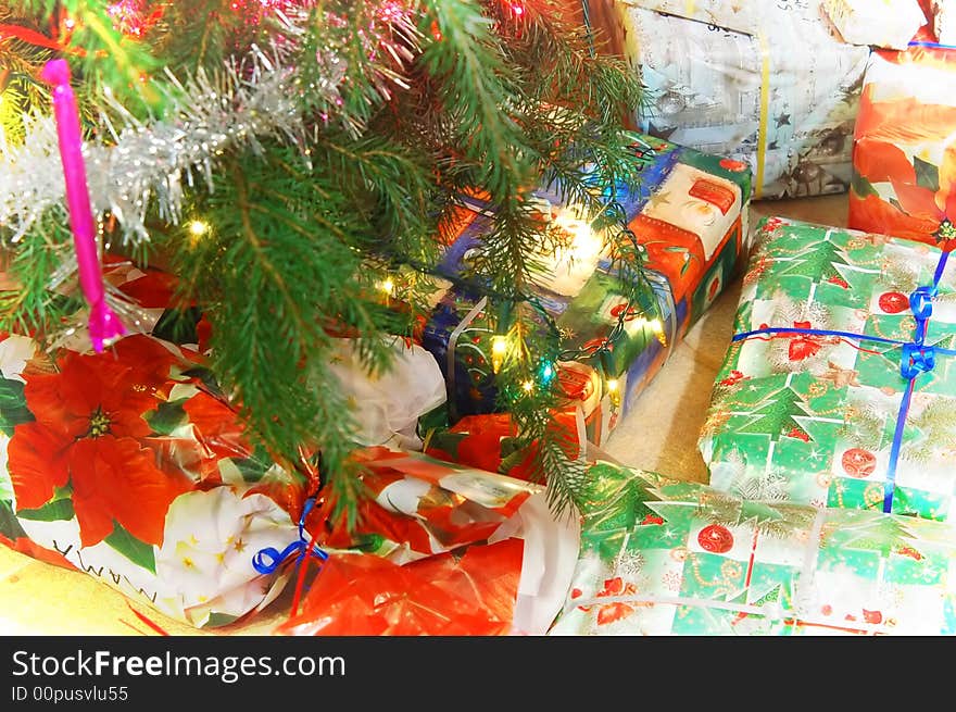 Christmas background. Christmas tree and gifts