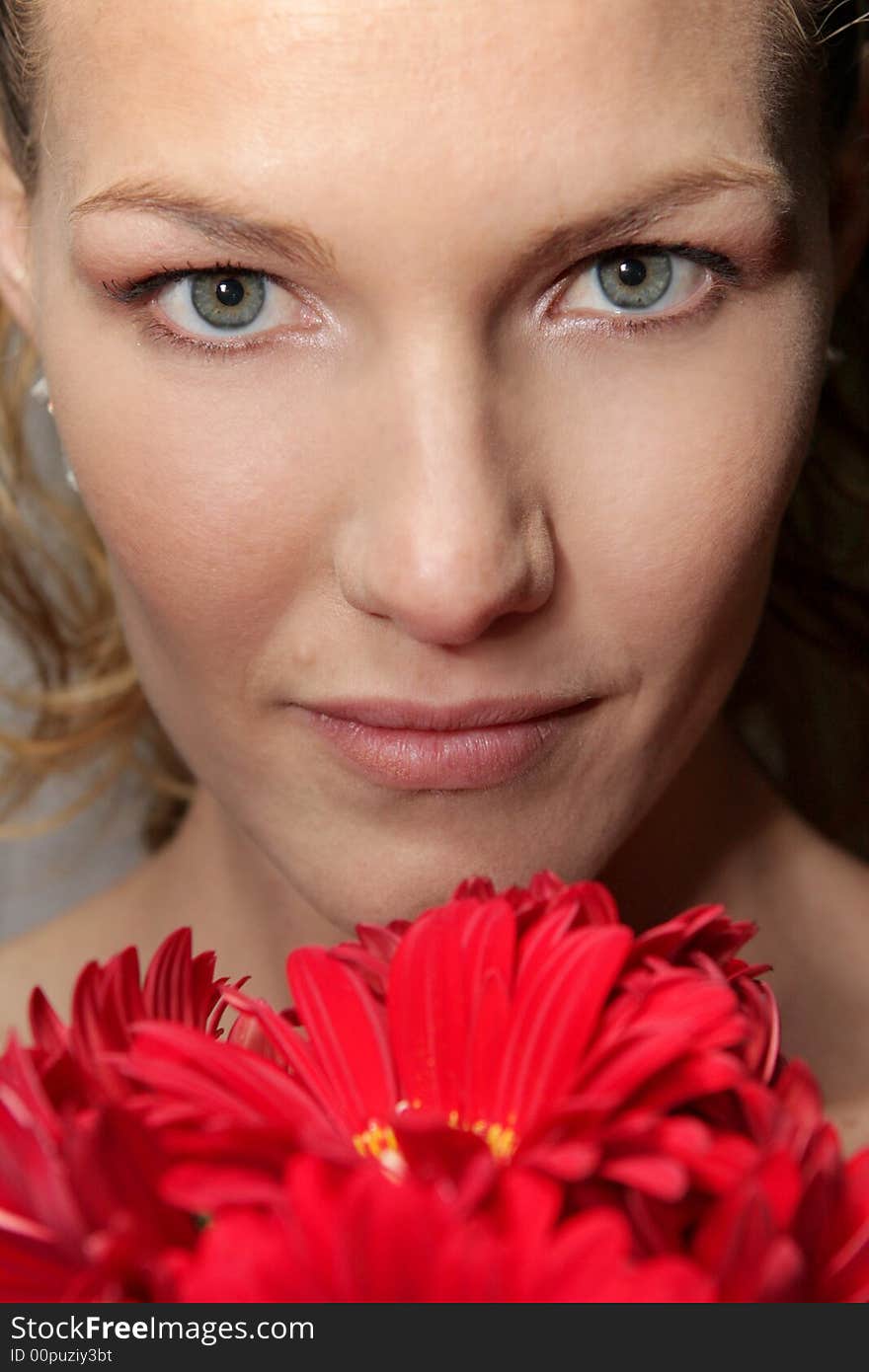 A bride holding her bouquet of flowers. A bride holding her bouquet of flowers