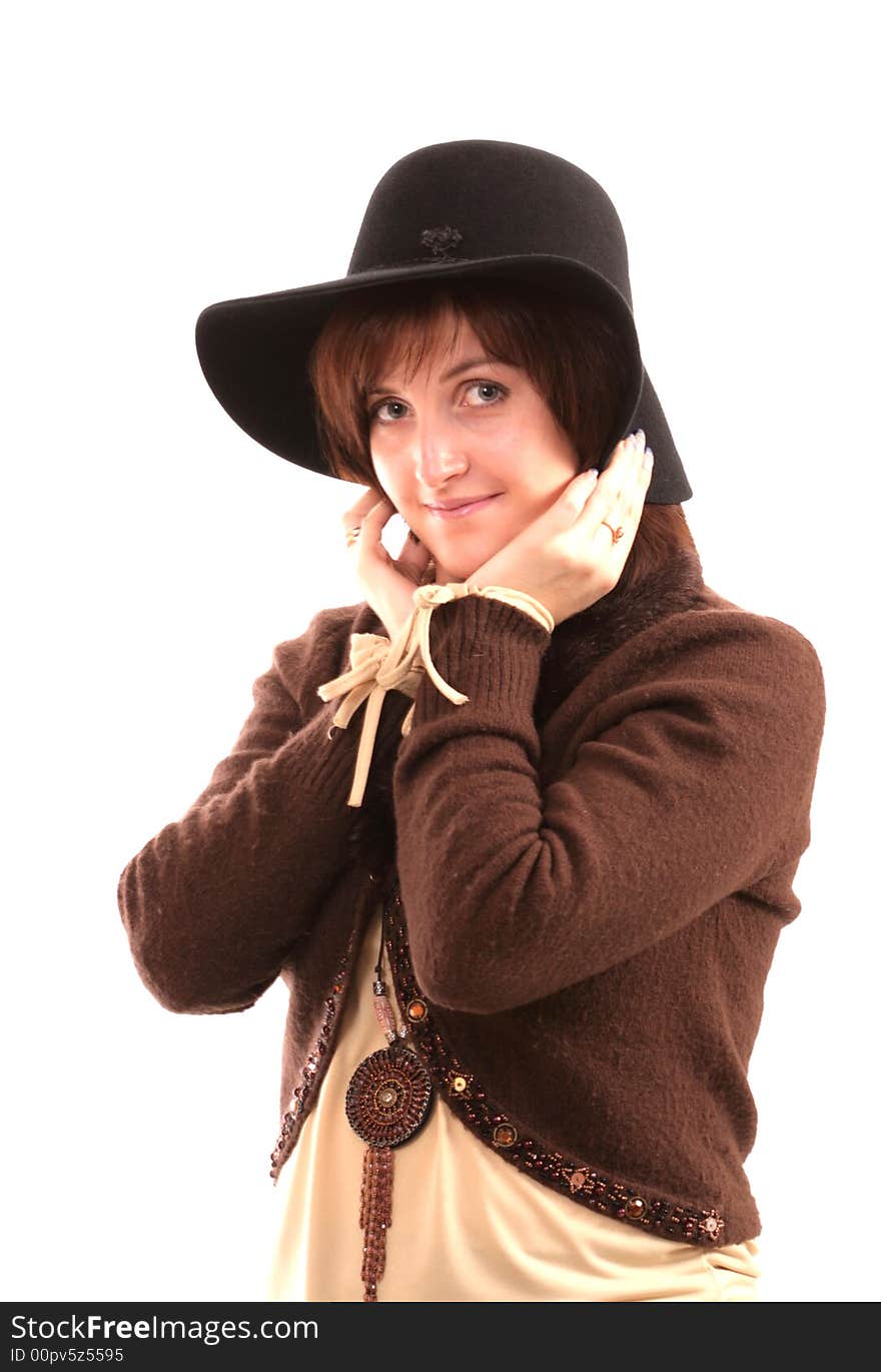 Portrait of the beautiful girl in a hat