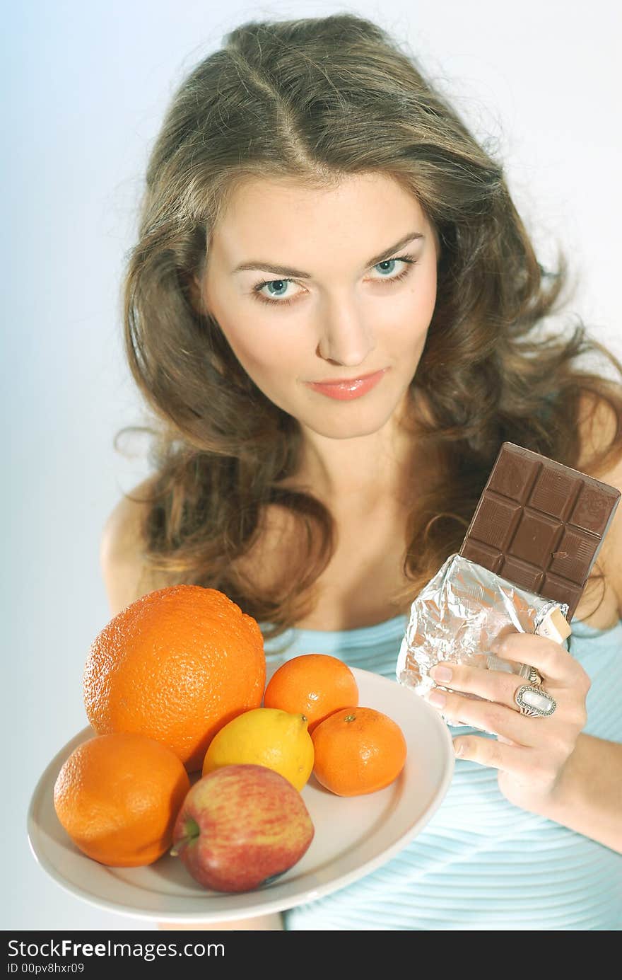 Woman With Fruit And Chocolate