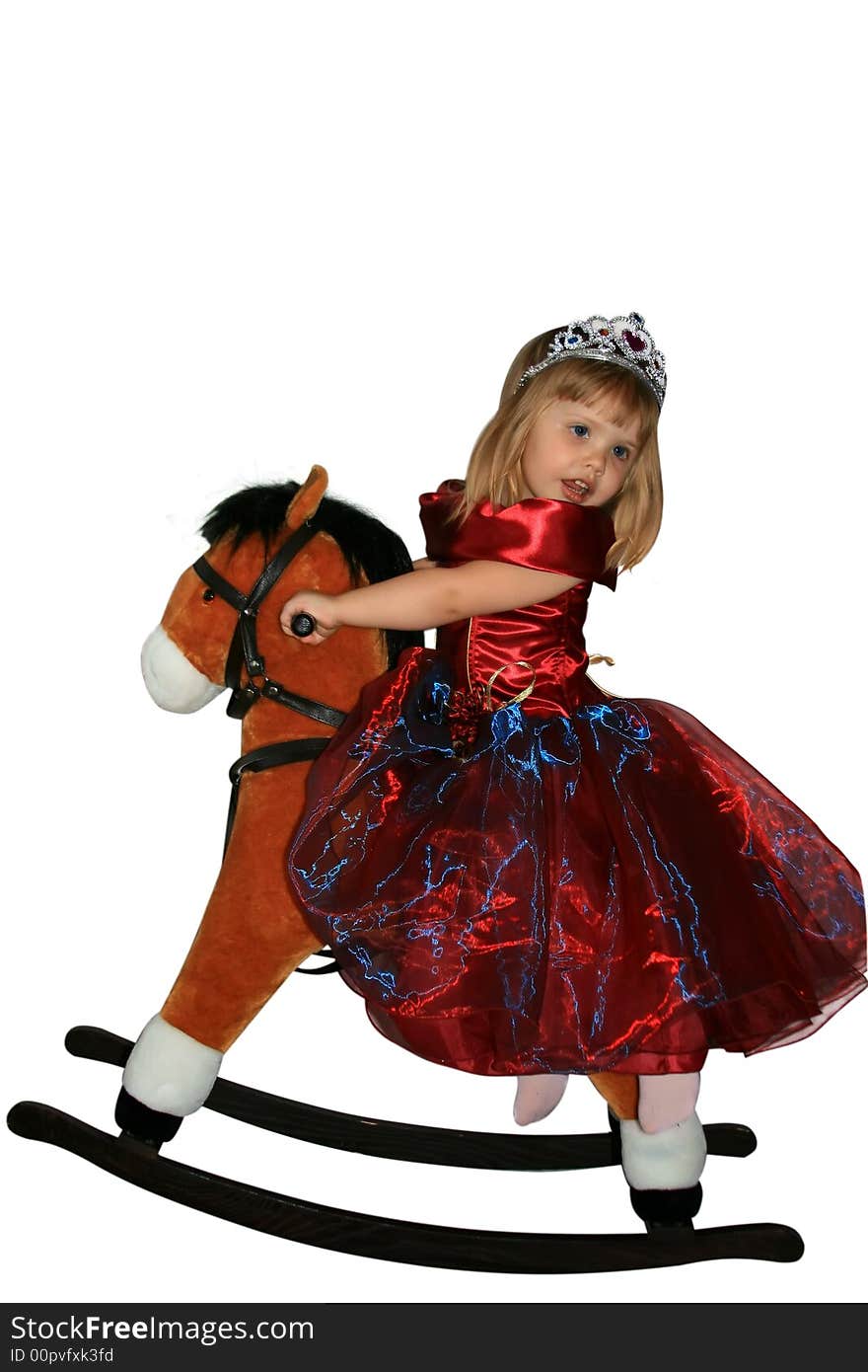 The little girl on a toy horse