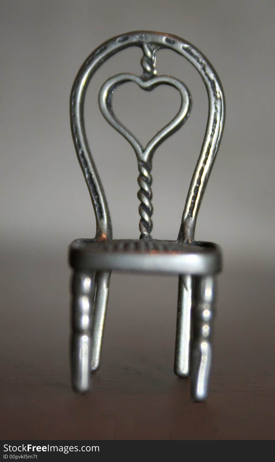 Chair made of aluminium with a beautiful heart in the middle. Chair made of aluminium with a beautiful heart in the middle